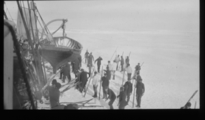 Image of Sealers by vessel, boat in davit
